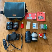 Canon SLR Film Camera with 2 Lenses Flash and 2 New Film Rolls