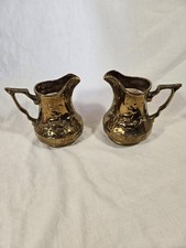 A Pair Of Wade Copper Lustre Jug In Deer Pattern