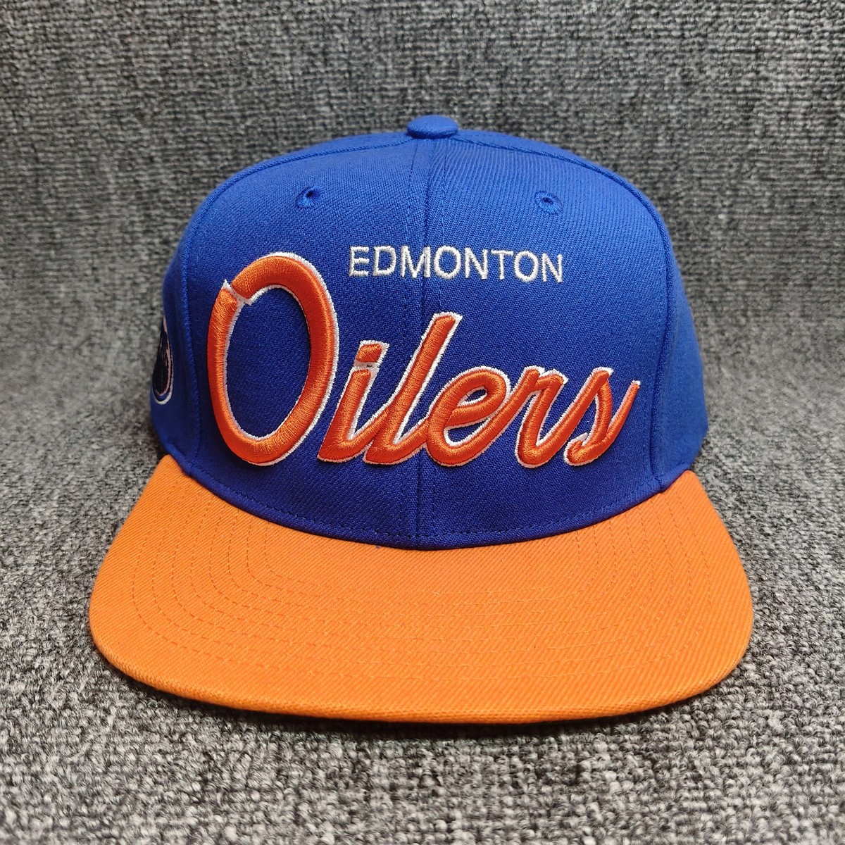 Mitchell & Ness Edmonton Oilers NHL Snapback Hat Blue Orange Script Logo