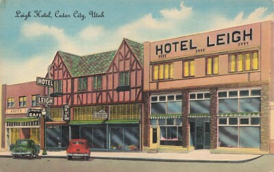 Postcard UT Cedar City Leigh Hotel Classic Cars Piute Cafe Street Sidewalks DB
