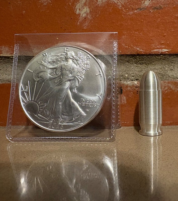 Lot of 2 Premium 1 Oz Silver (.45 ACP bullet & 26  American Silver Eagle)