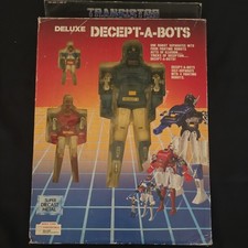 Transistor Robots Decept-A-Bot's Deluxe Super Diecast Metal Robot Set, 1980s