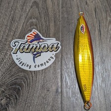 TJC500-100 Slow Pitch Jig: Gold and Red Cooper with Glow. Monster 500