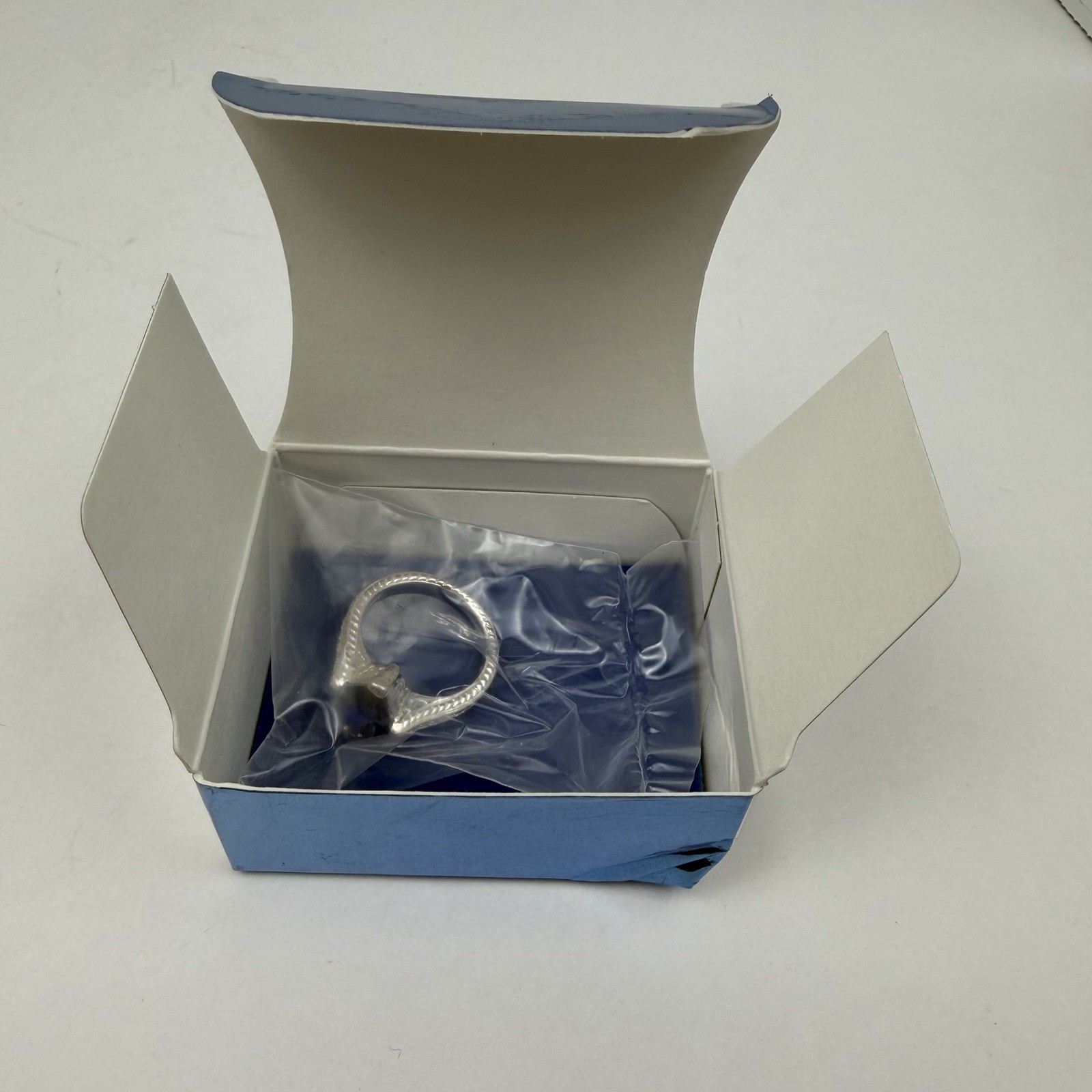 Avon Sterling Silver Diamond Shaped Sapphire Ring w/CZ Accents size 8 New in Box