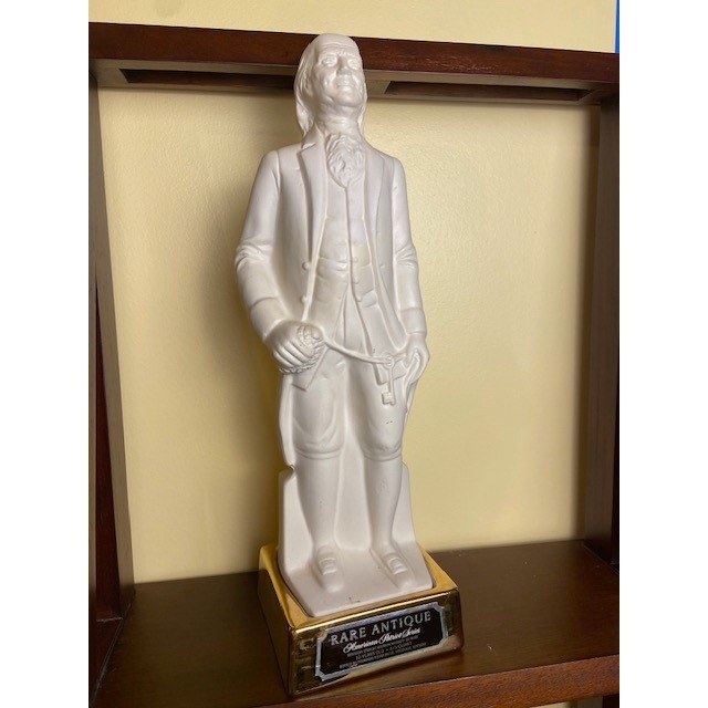 A Benjamin Franklin bourbon decanter from the American Patriot Series — a quirky, conversation-starting piece of Americana that's equal parts collectible and barware.