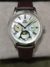 Orient KUE0-UAA0 Sun and Moon Day/Date Ladies Watch- Pearl Dial  + New Battery.