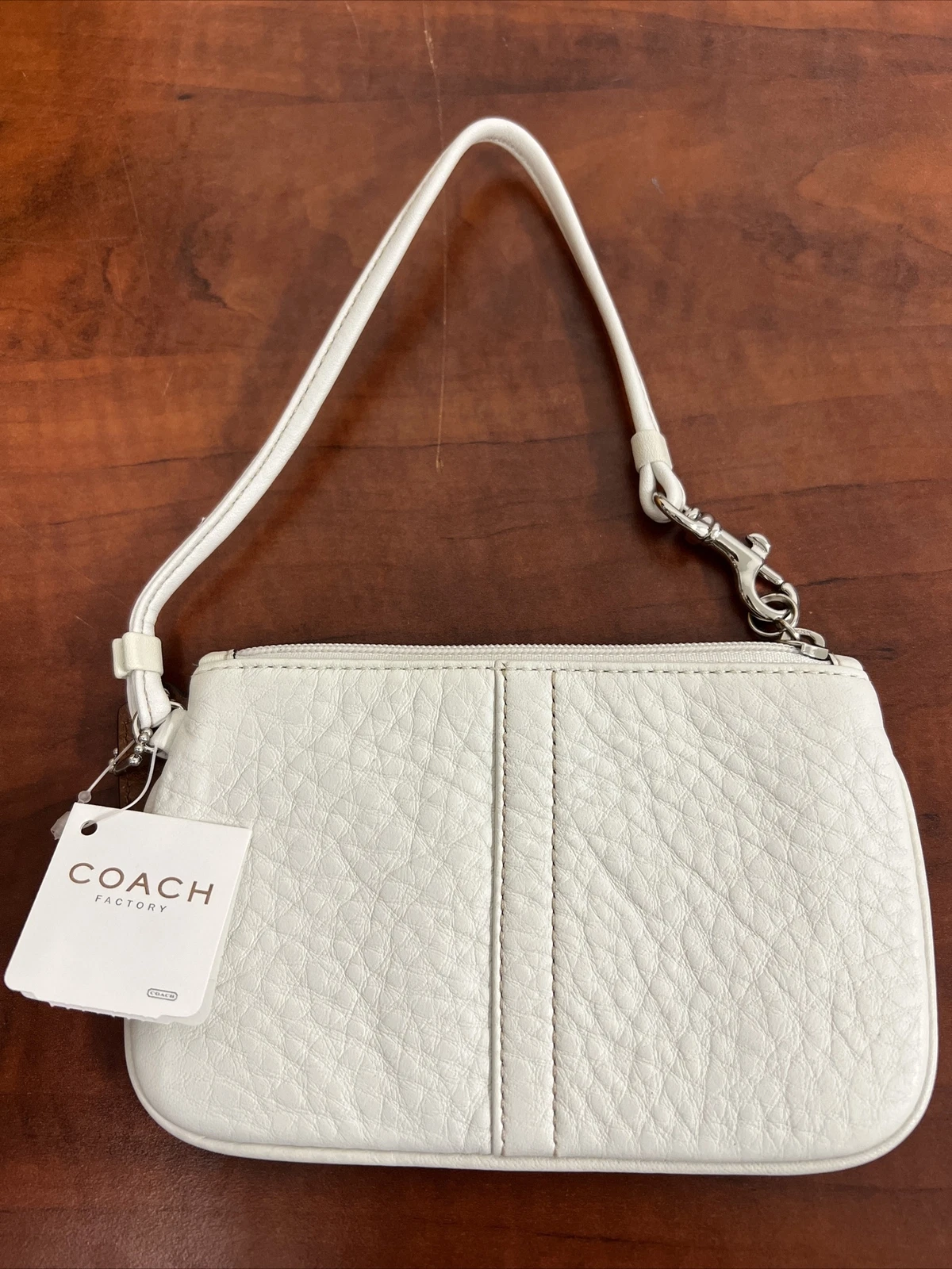 Portachiavi piccolo portafoglio da polso Coach Off in pelle bianca