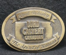 XC21148 VINTAGE 1970s LORD CALVERT CANADIAN REAL WHISKEY SPIRIT BELT BUCKLE