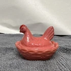 Westmoreland vintage pink milk glass miniature hen on a nest.