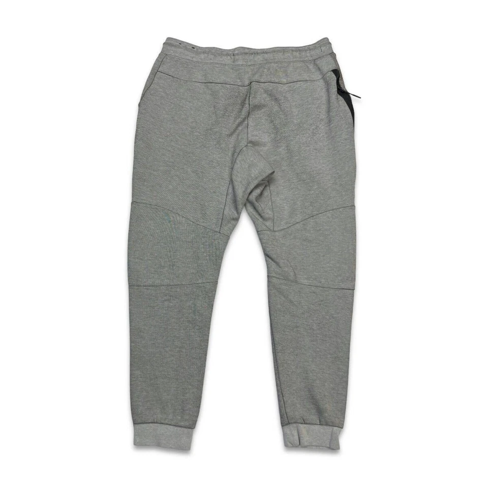 Pantalones deportivos Nike Sportswear para hombre grandes grises Swoosh Tech polar atléticos jogger Foto 3 de 4
