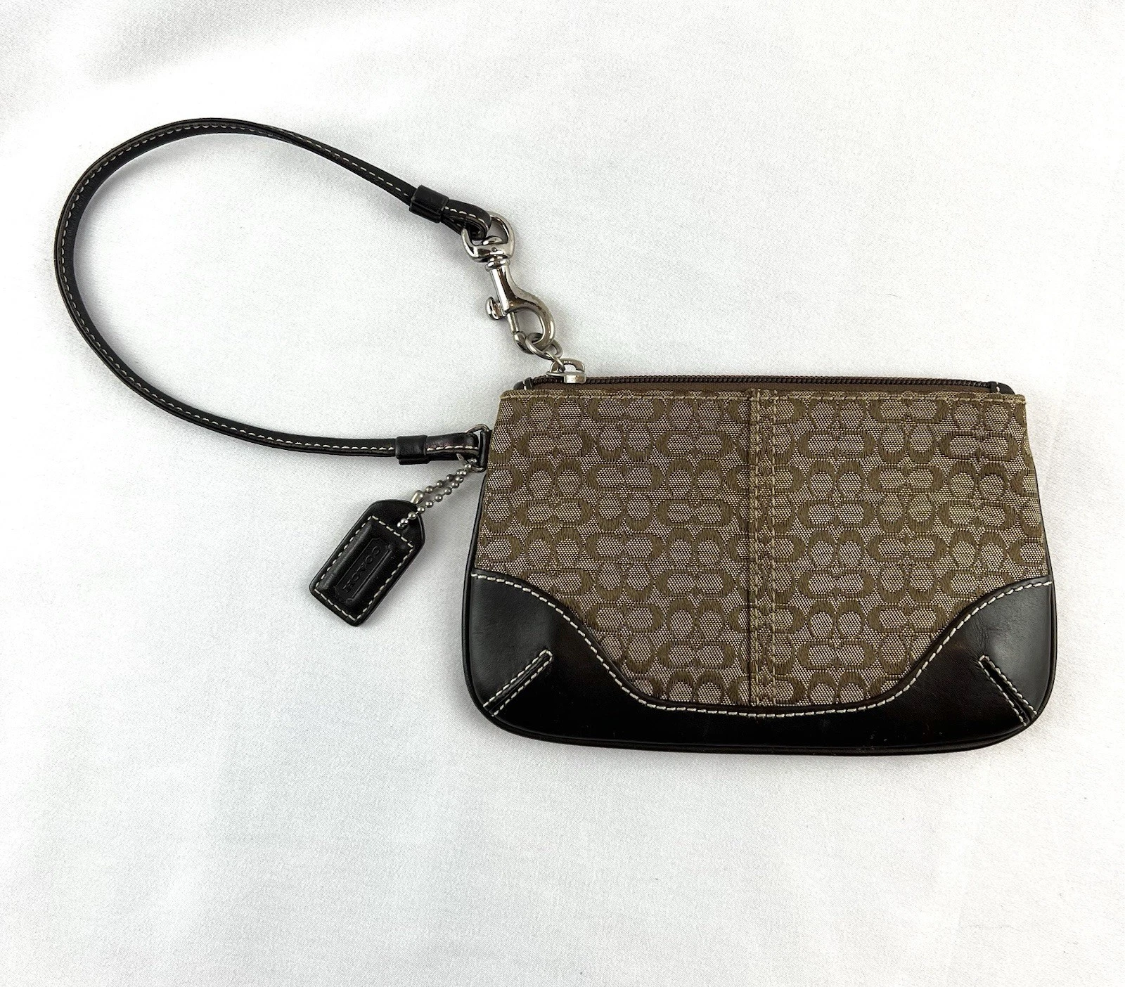 Coach Wristlet Signature C tela bordo in pelle marrone Y2K us intime ottimeioni