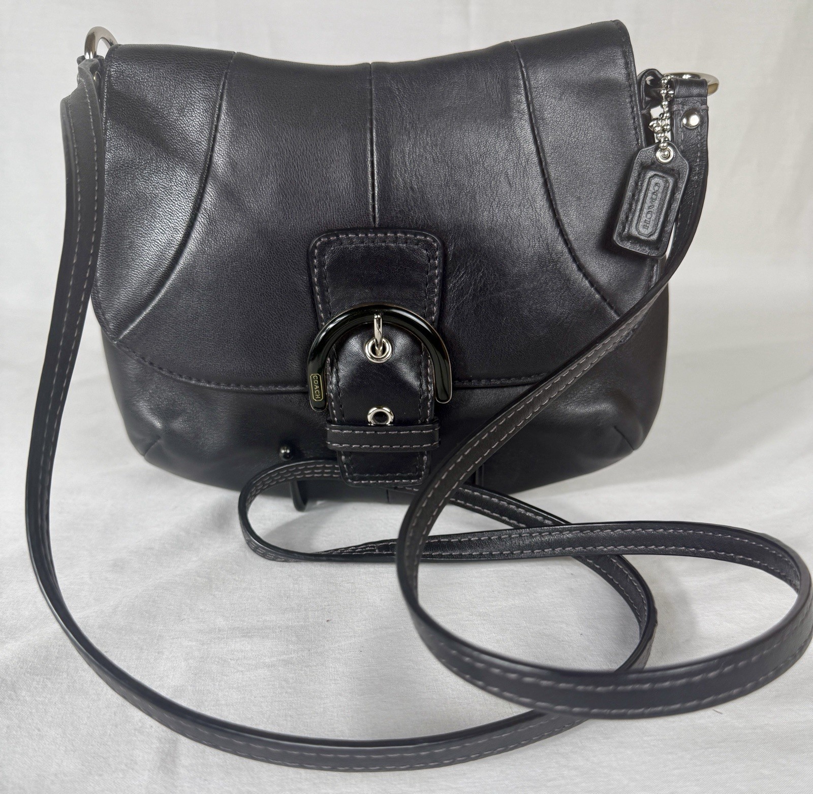 😎😎😎COACH Black Soho Leather Buckle Flap Crossbody Swing Pack Bag COACH Charm