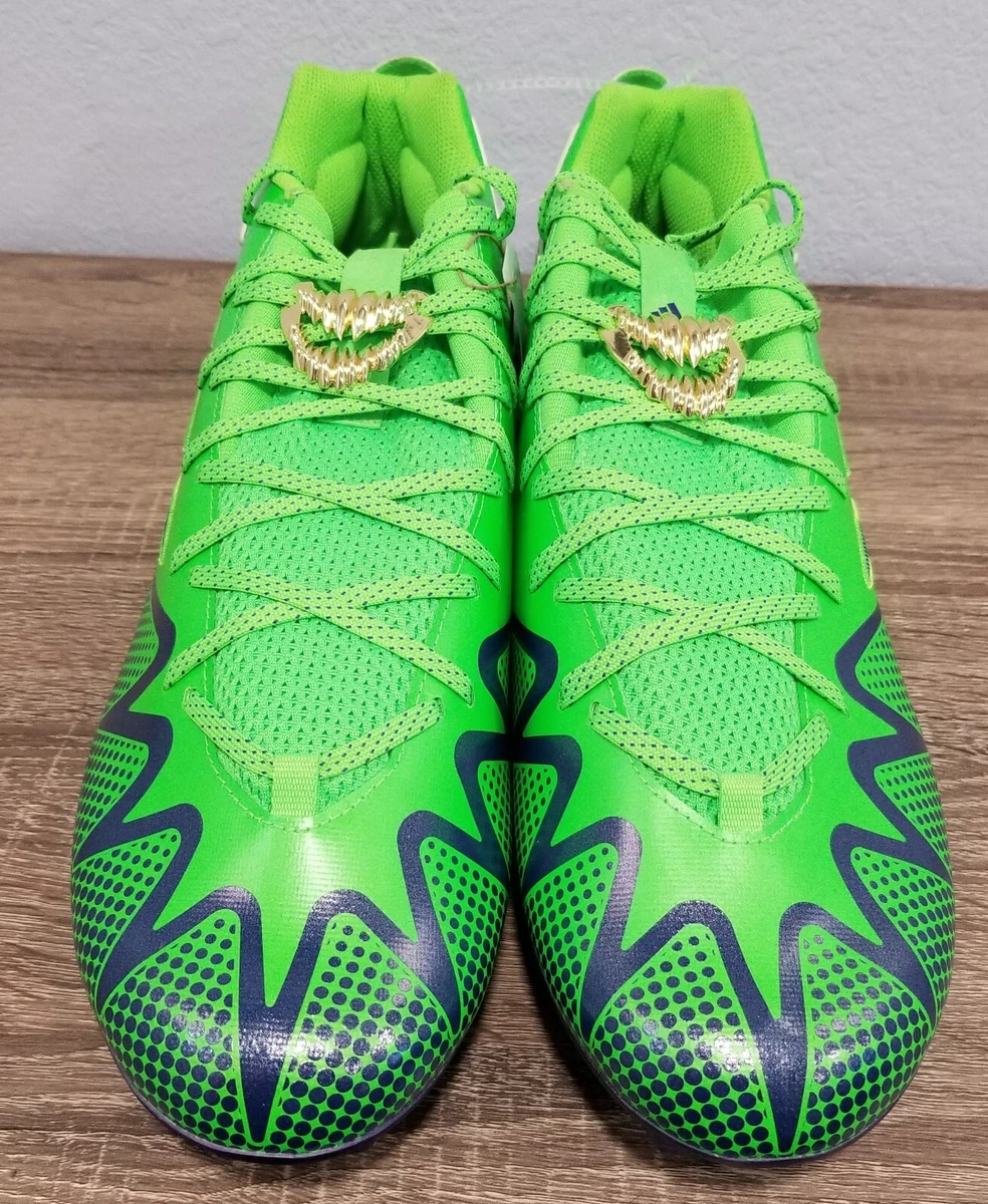 Purple and white sale adidas football cleats