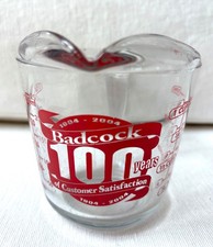 Badcock 100 Years Commerative Measuring Cup 1904-2004