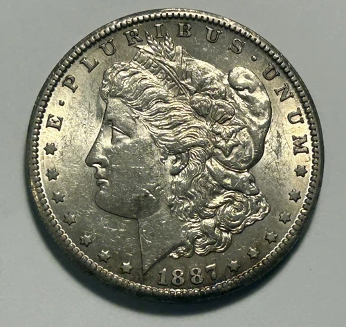 1887 S MORGAN DOLLAR AU