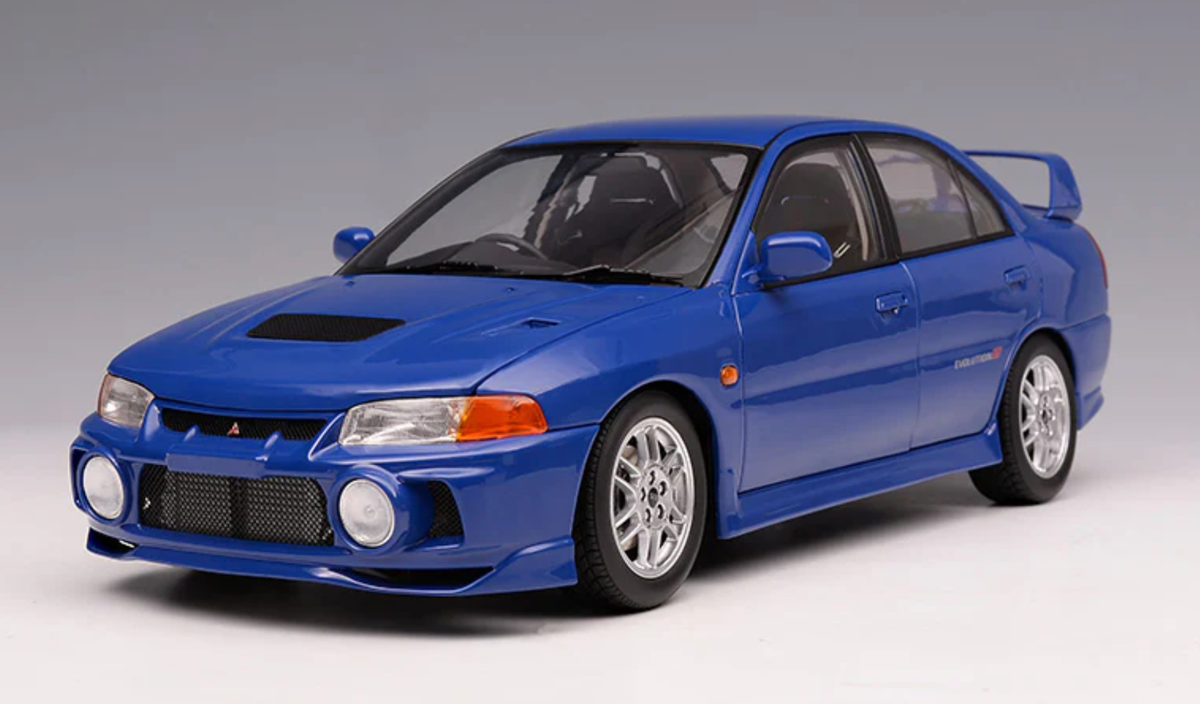 1/18 MotorHelix Mitsubishi Lancer Evolution IV Icella Blue M84005