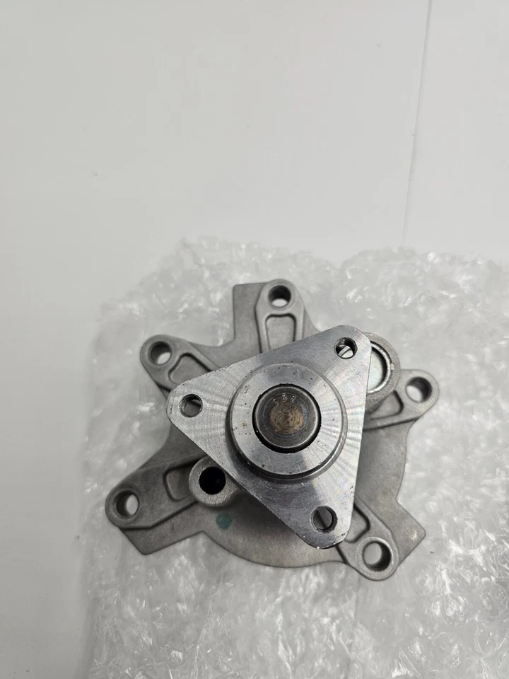 Bomba de agua del motor T1229 para Scion -xa 04-06 Echo 00-05 Prius 01-09 Yaris 06 Foto 4 de 4