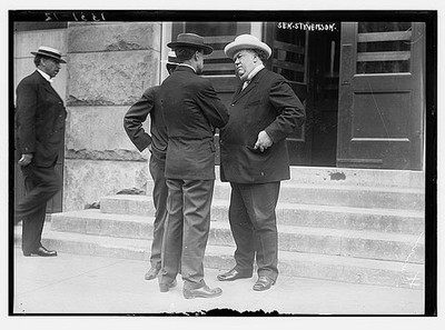 Photo:Sen. Stevenson with Men Outside Building