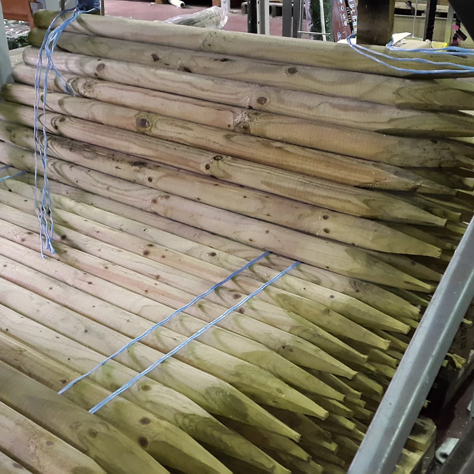 Round Wooden Fence Posts 1.2m x 50mm Treated Pointed Tree Stake Wire Fencing x5 - Image 2 of 4