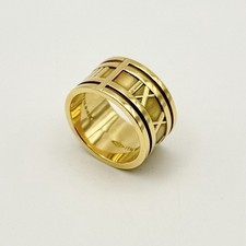 Anillo Tiffany & Co Atlas Oro Amarillo 18K Banda Ancha Número Romano Talla 8