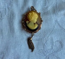 Vintage cameo locket pendant, celluloid lady,ornate gold tone frame,large size