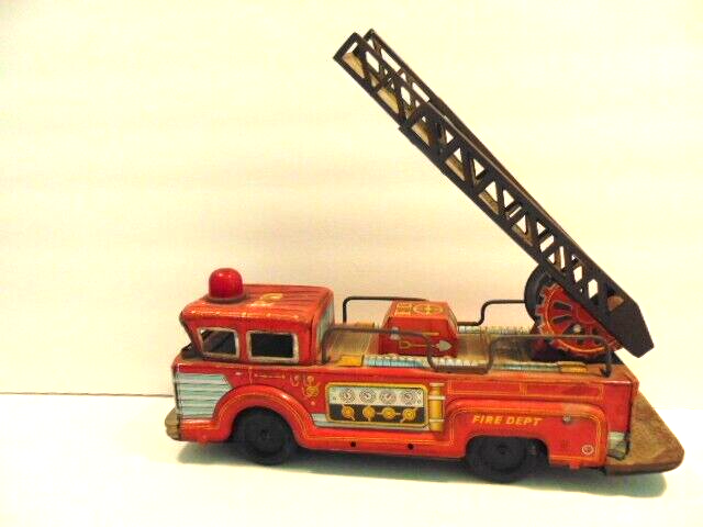 vintage tin toy fire truck with ladder: Trade Mark 