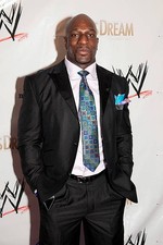 Titus O'Neil attends WWE's 2014 SuperStars For Kids at the New Orl- Old Photo