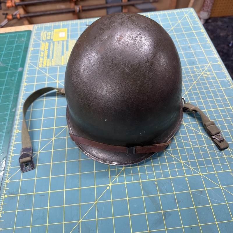 US WW2 M1 Helmet, front seam, swivel bale. Firestone post war liner. 
