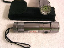 8 bulb flashlight w/ a red laser light AAA batteries with case