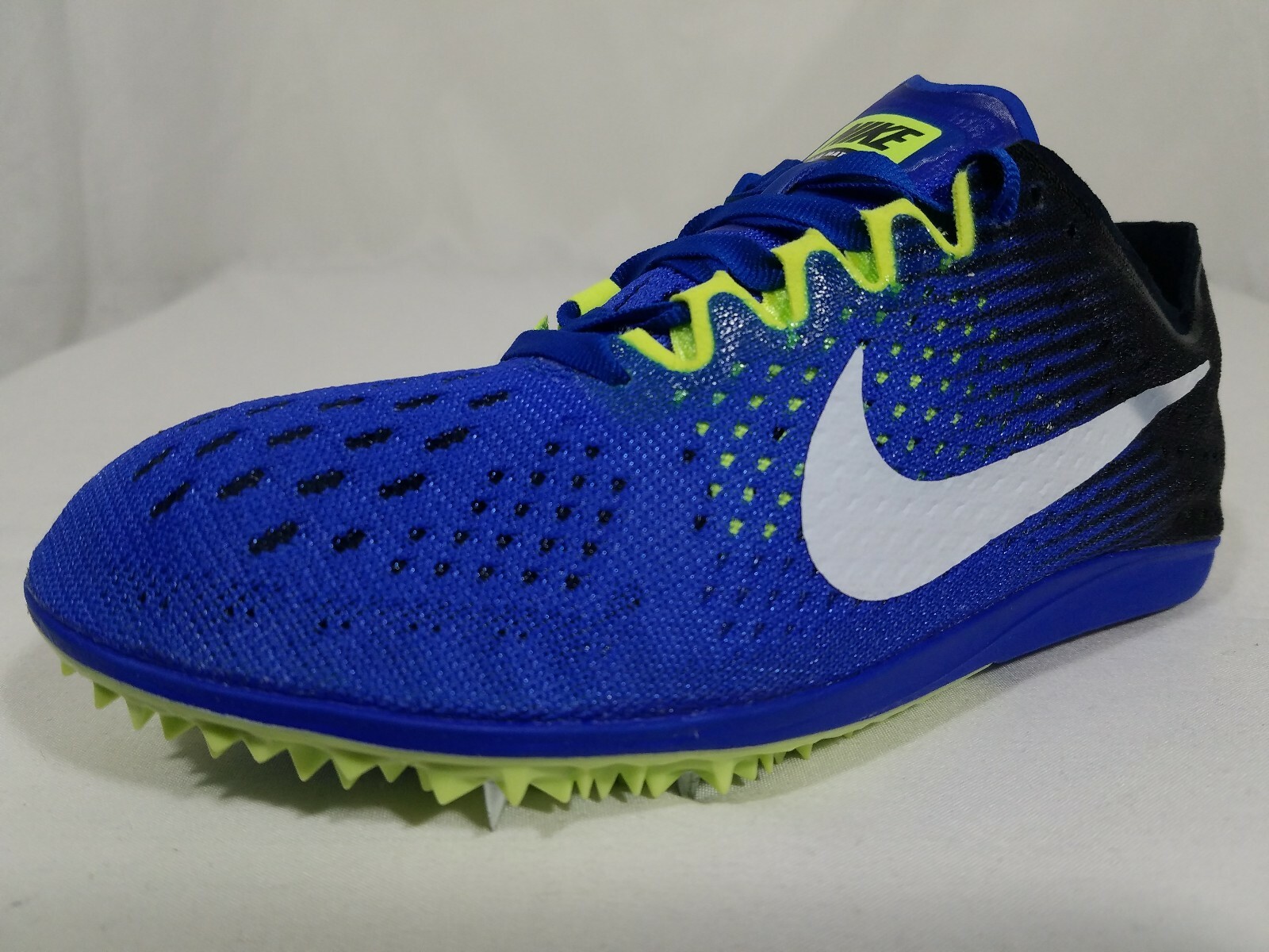 blue nike track shoes
