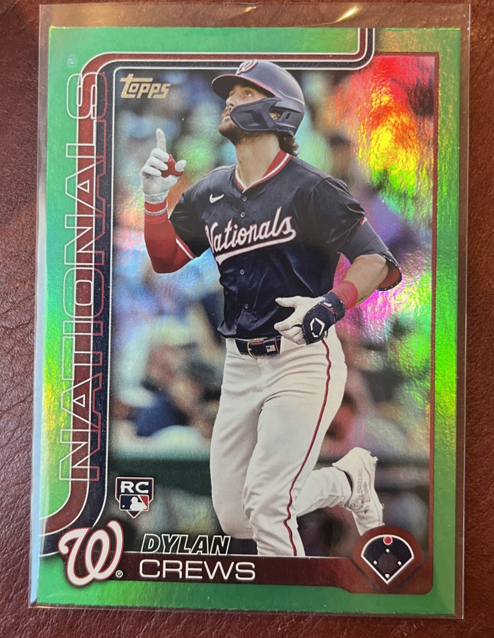 2025 Topps #74 Dylan Crews Green Foil Parallel Rookie Card (53/99) Washington