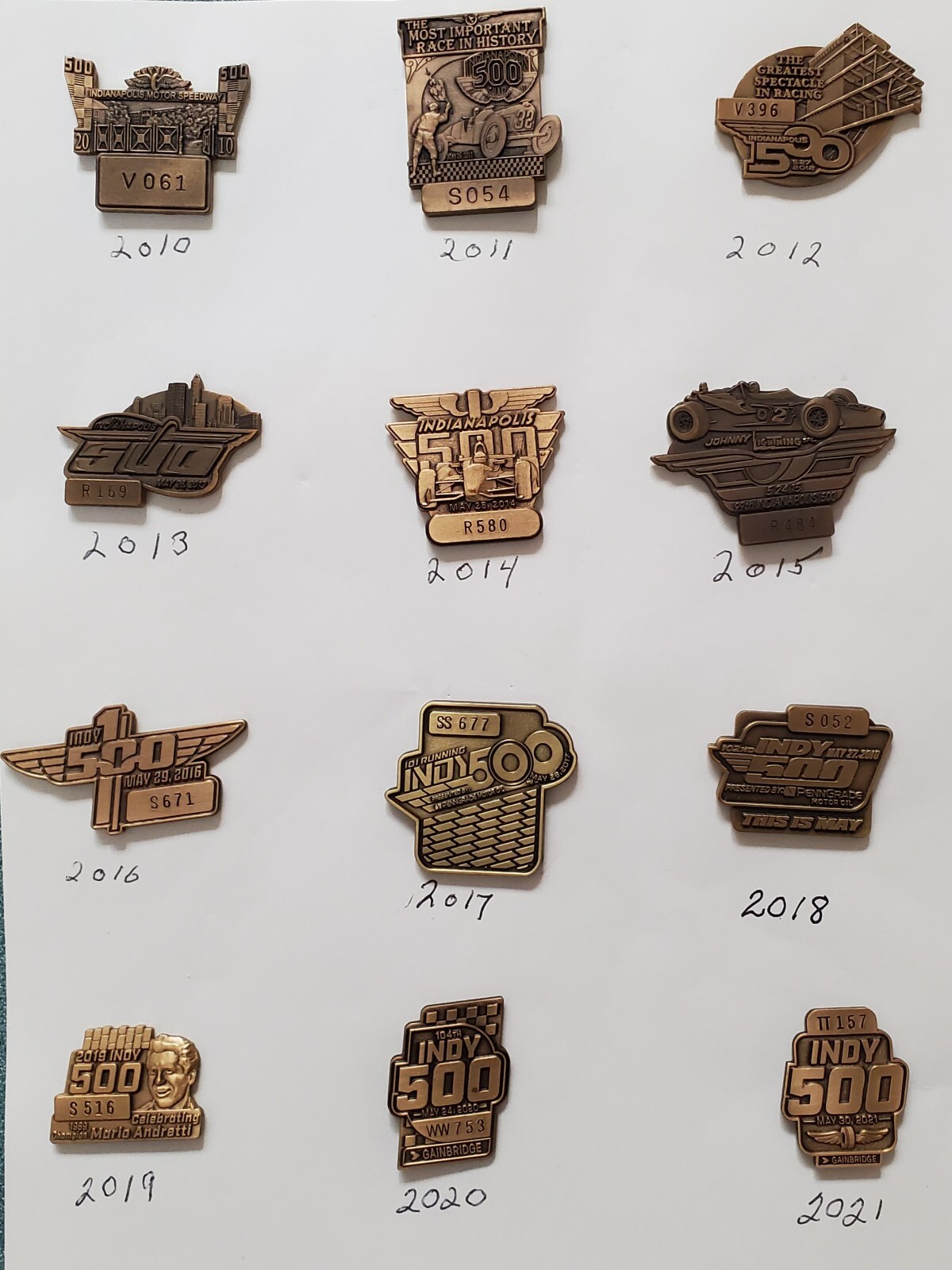 75 Authentic 19472021 Consecutive Indy 500 Bronze Pit Pass Badge Collection! eBay