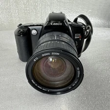 Canon EOS Rebel XS DS126191 Camera w/Zoom Lens 28-200mm, Strap, Battery V10