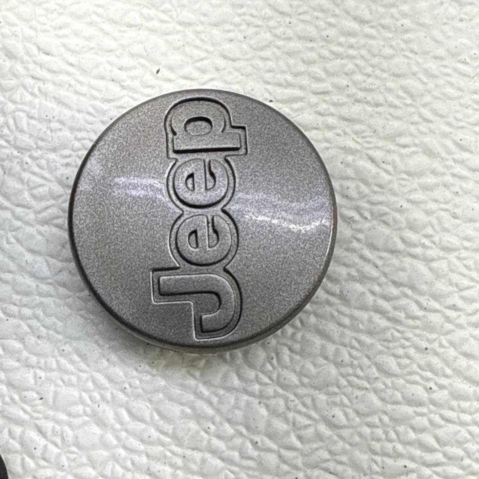 Tapacubos gris OEM 1997-2001 Jeep Cherokee XJ Wrangler llanta (1) Foto 2 de 4