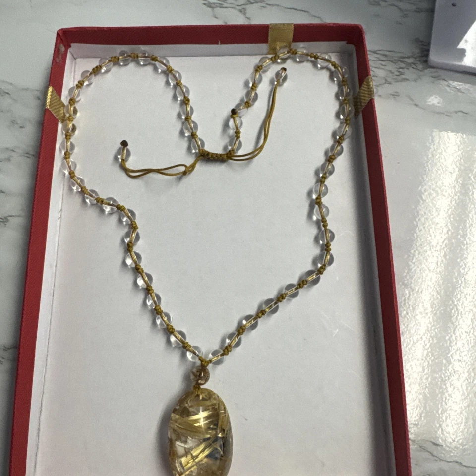 Colgante de cristal de titanio natural Foto 4 de 4