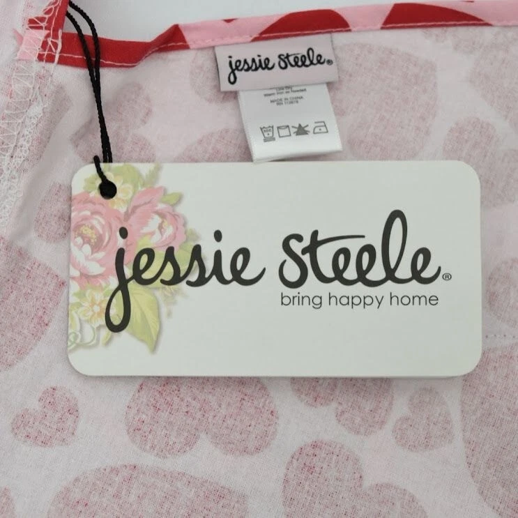 Delantal estilo halter Jessie Steele Bombshell Sweethearts rojo y rosa con bolsillo Foto 3 de 4