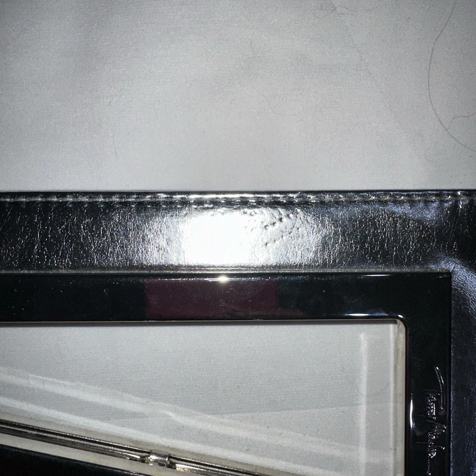 Cartera sin asas Thierry Mugler grande plateada metálica plegable estrella usada Foto 2 de 4