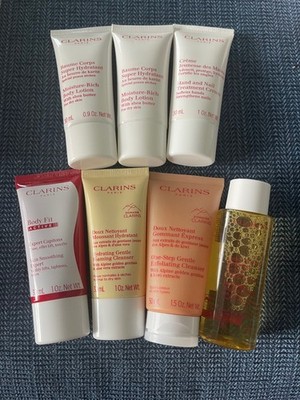 Clarins Face and Body treatments 7 Piece travel sizes - New