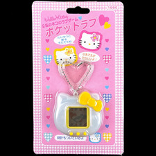 1997 Sanrio Hello Kitty Pocket Love Yellow Digital Virtual Pet Toy Tamagotchi