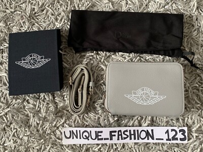 CHRISTIAN DIOR X AIR JORDAN1 ZIPPED COMPACT BAG LOW HIGH MAN