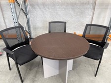Round meeting table with 3 mesh chairs