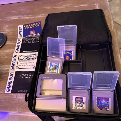 Ninetendo gameboy game lot 4- Tetris, Monopoly, caesars palace + Light boy & Bag