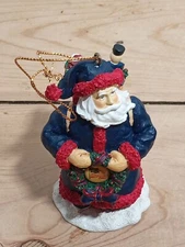 The Memory Company USA Santa Ornament Limited Edition Christmas Holding Wreath