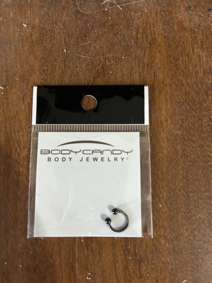 Juego de 5 piercings con barra de joyería de caramelo corporal nunca abiertos nuevos en paquete Foto 3 de 4