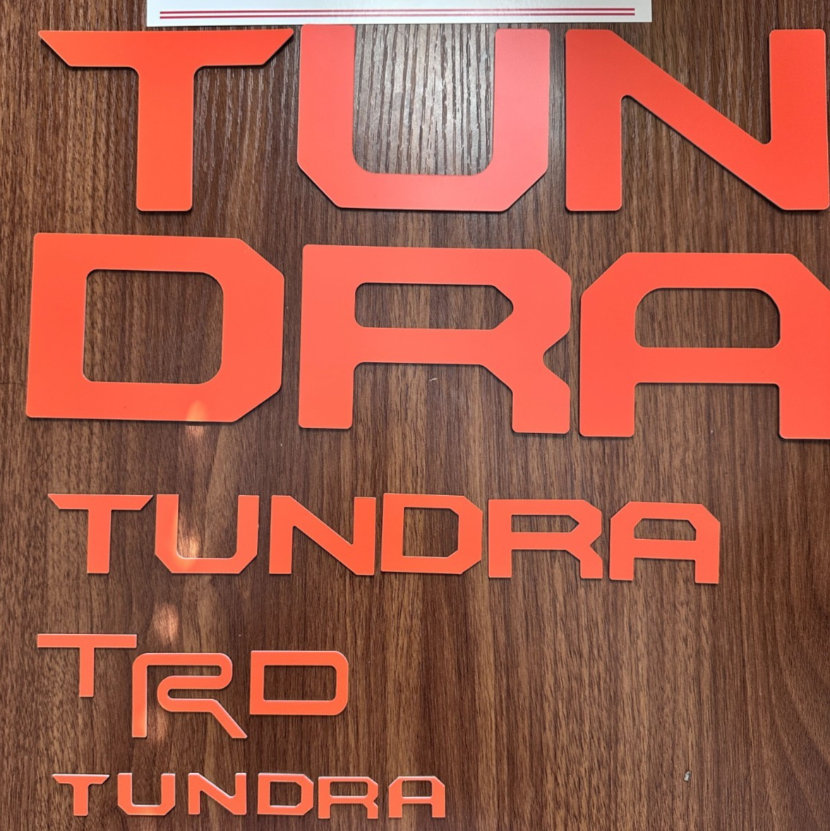 SET OF 3: ORANGE DASHBOARD + TAILGATE + GRILL LETTERS TUNDRA 2022-2025