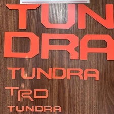 SET OF 3: ORANGE DASHBOARD + TAILGATE + GRILL LETTERS TUNDRA 2022-2025