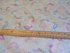 Pale Blue With Pastel Colored Unicorns Cotton Fabric BTY