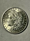 1887 O Morgan Dollar    solid ch bu  clearance was $141 now $109