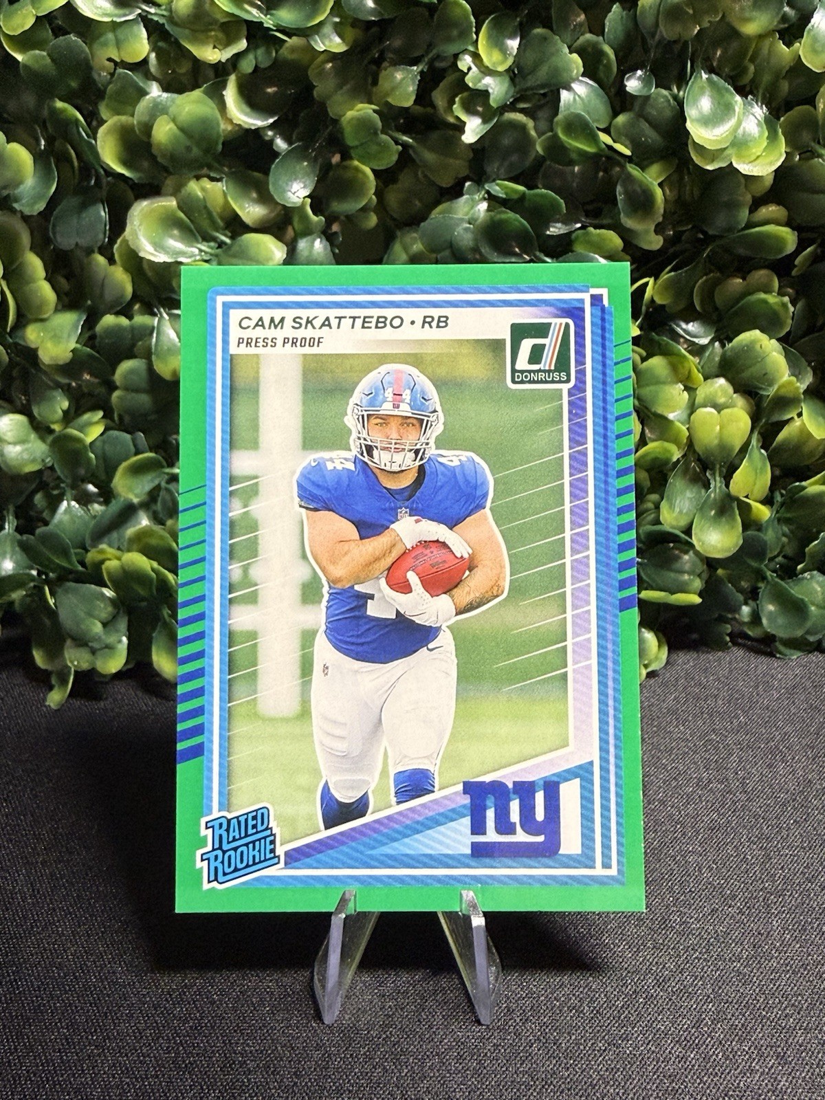 2025 Panini Donruss - Rated Rookie Cam Skattebo #302 Press Proof Green (RC)