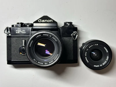 ✱ Canon F-1 analoge Spiegelreflexkamera schwarz mit FD 50mm f/1.4 & 28mm f/2.8 - Bild 1 von 4